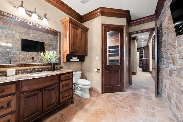 a view of a kitchen cabinets and a wooden floor
