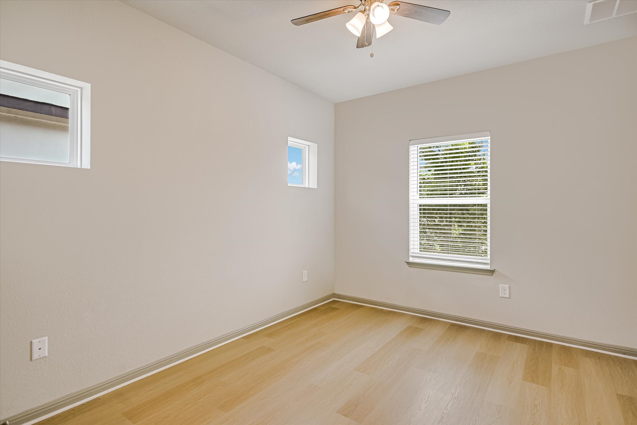 5613 Charles Merle Dr. Austin, TX 78747 - Photo 15 of 34 an empty room with a window