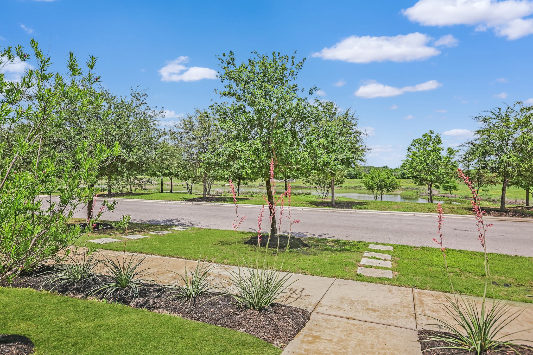 5613 Charles Merle Dr. Austin, TX 78747 - Photo 2 of 34 a view of a park with large trees