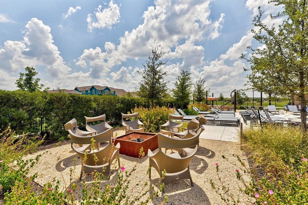 5613 Charles Merle Dr. Austin, TX 78747 - Photo 27 of 34 a view of a swimming pool with outdoor seating