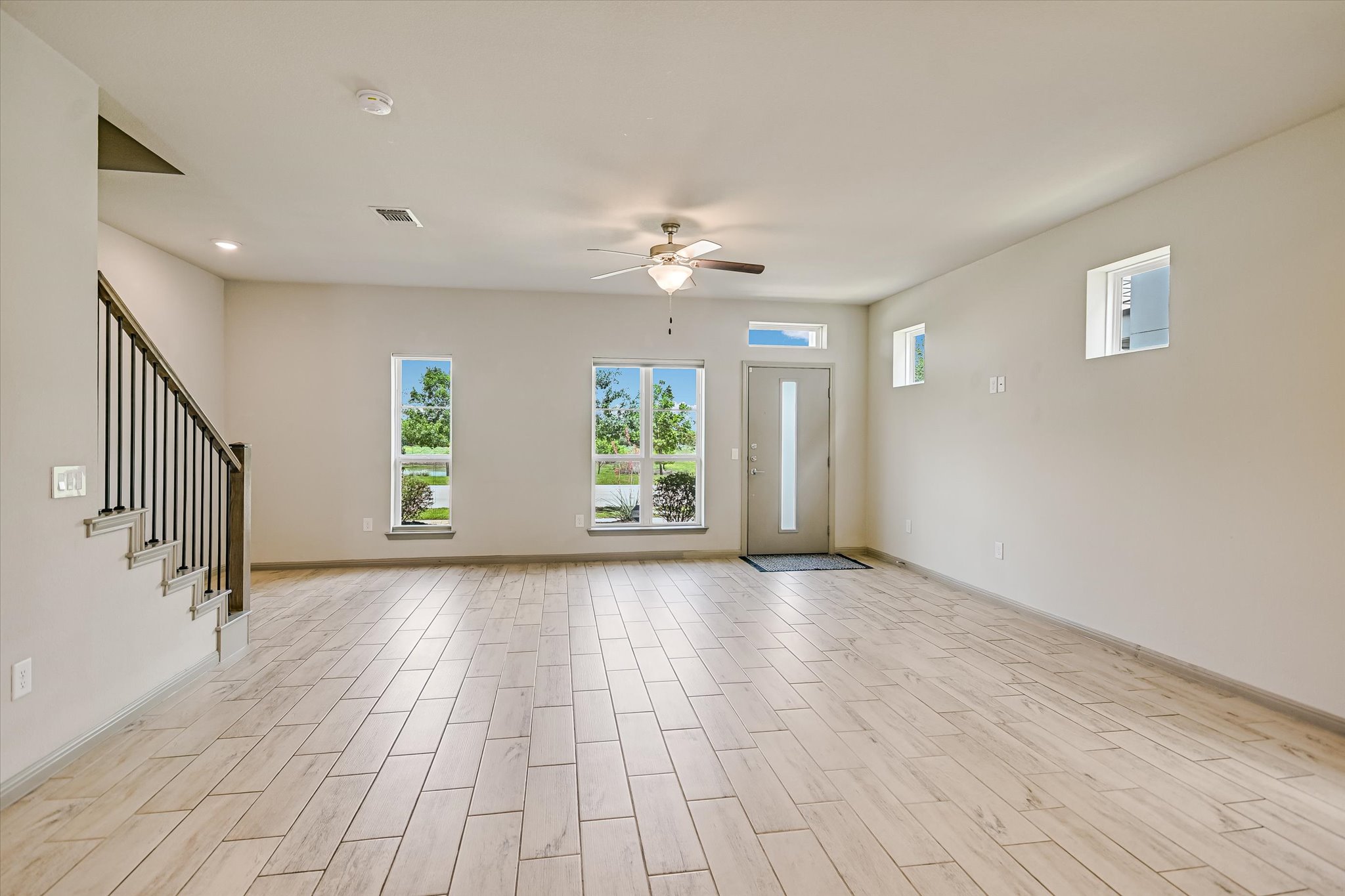 5613 Charles Merle Dr. Austin, TX 78747 - Photo 4 of 34 a view of an empty room with a window