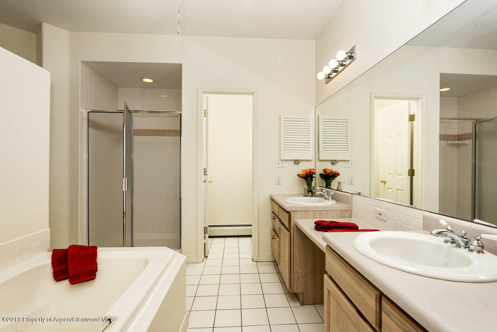 17 Pine Ridge Road Basalt, CO 81621 - Photo 13 of 28 a bathroom with a tub sink and mirror
