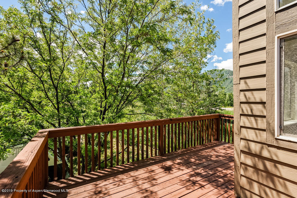 17 Pine Ridge Road Basalt, CO 81621 - Photo 21 of 28 a balcony with trees in front of it