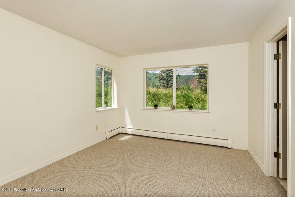 17 Pine Ridge Road Basalt, CO 81621 - Photo 23 of 28 an empty room with windows