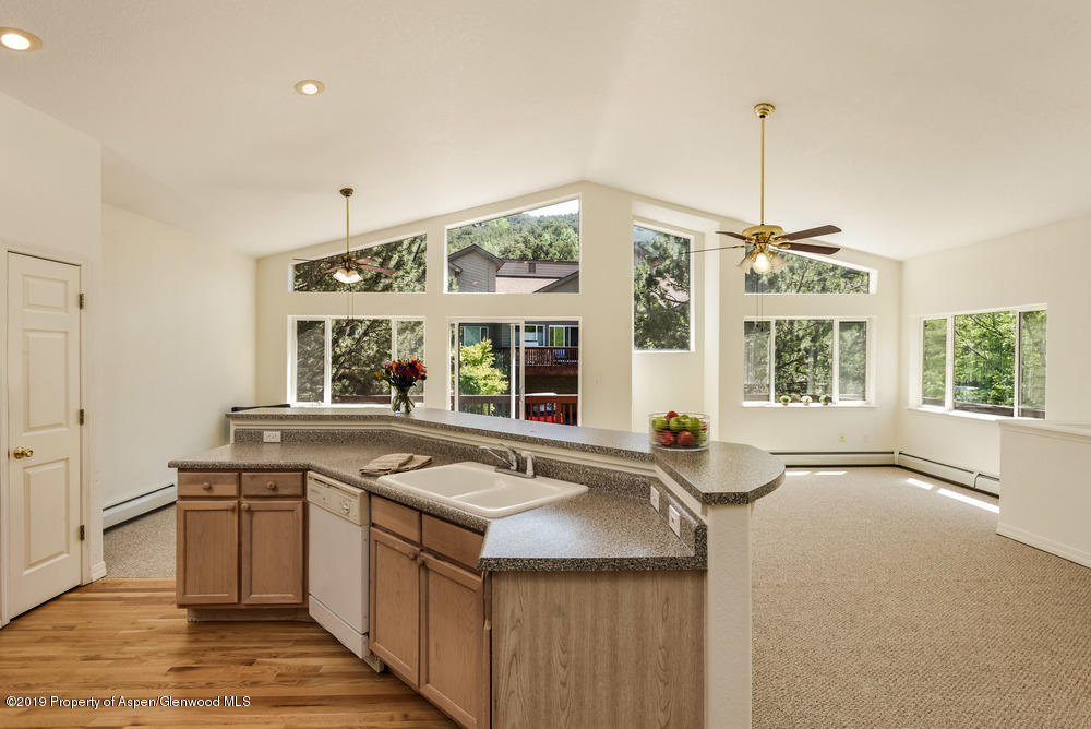 17 Pine Ridge Road Basalt, CO 81621 - Photo 3 of 28 a kitchen that has a lot of windows in it