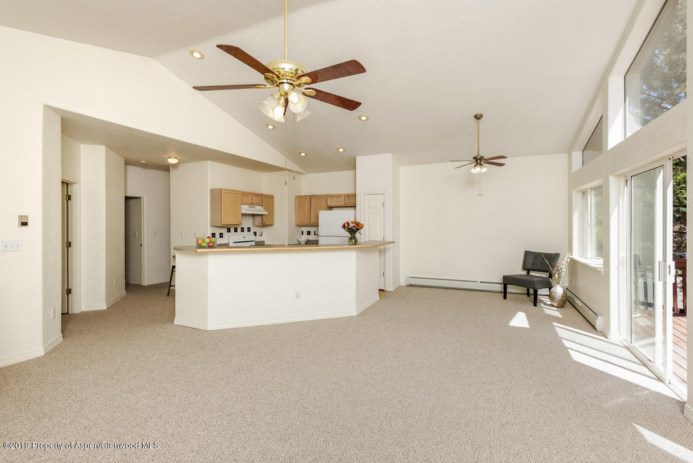 17 Pine Ridge Road Basalt, CO 81621 - Photo 7 of 28 a view of a kitchen with a sink and a refrigerator