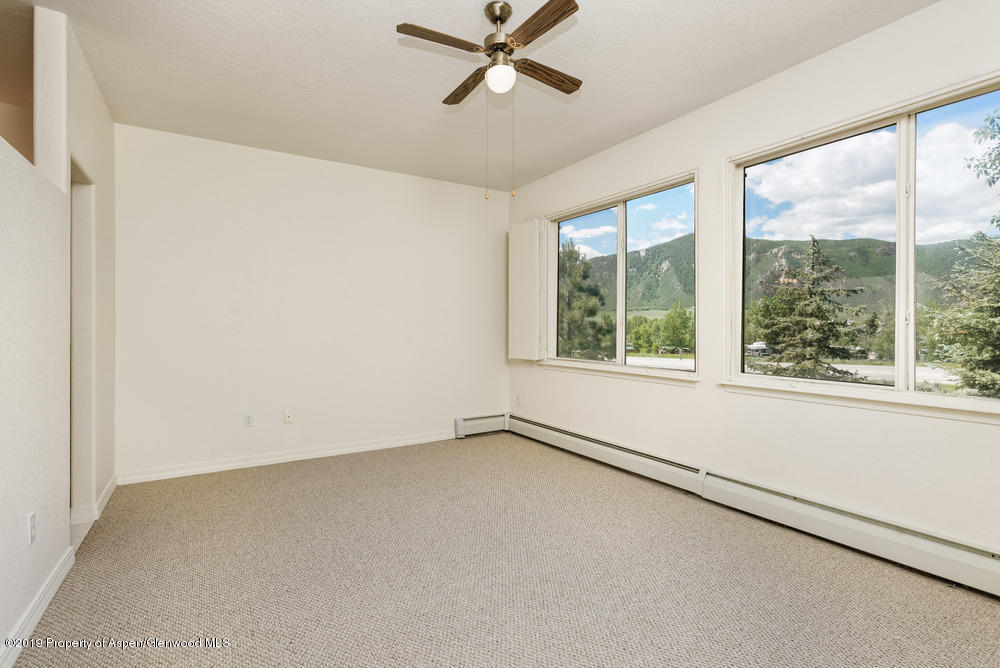 17 Pine Ridge Road Basalt, CO 81621 - Photo 9 of 28 an empty room with a window
