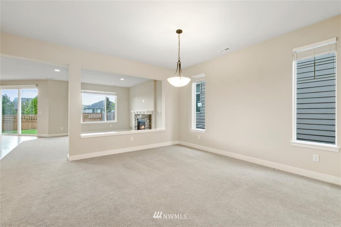 23004 44th Drive Southeast Bothell, WA 98021 - Photo 3 of 29 a view of an empty room with a window