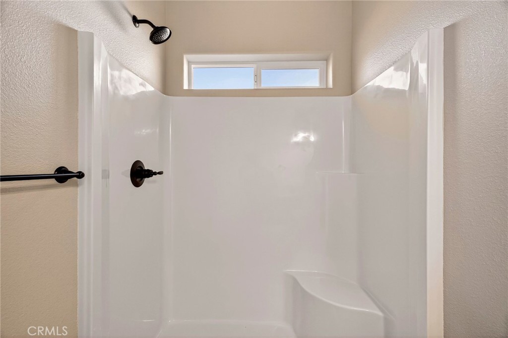 7083 Pentz Road Paradise, CA 95969 - Photo 28 of 46 a bathroom with a shower and a toilet