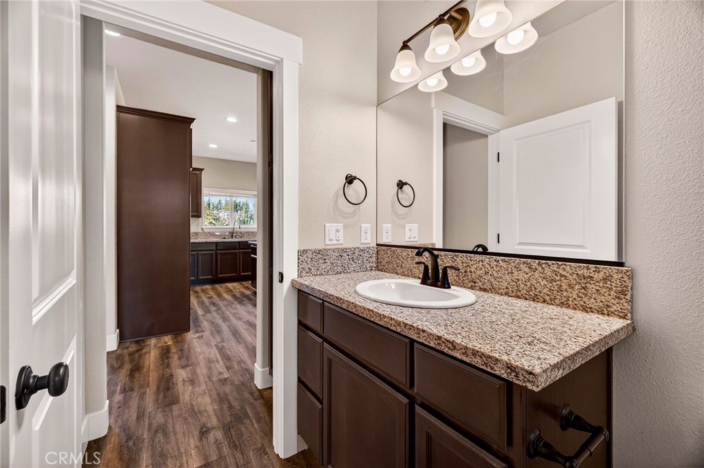 7083 Pentz Road Paradise, CA 95969 - Photo 35 of 46 a bathroom with a sink vanity and a mirror