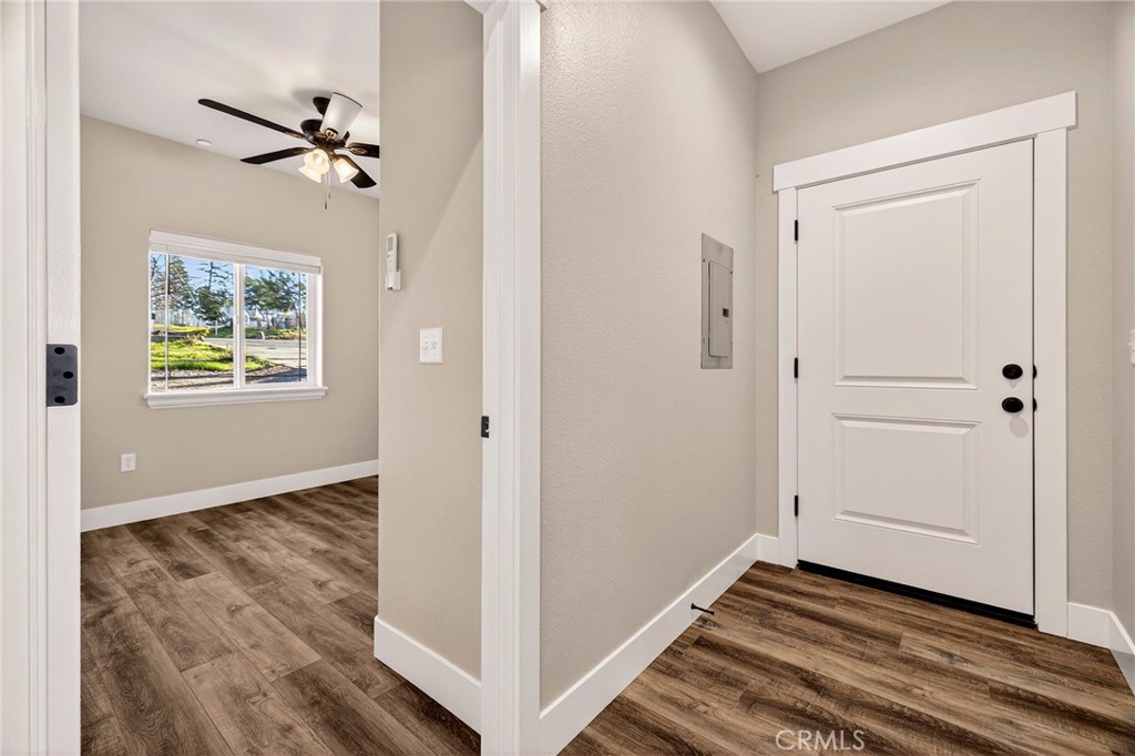 7083 Pentz Road Paradise, CA 95969 - Photo 38 of 46 a view of a hallway with wooden floor and closet