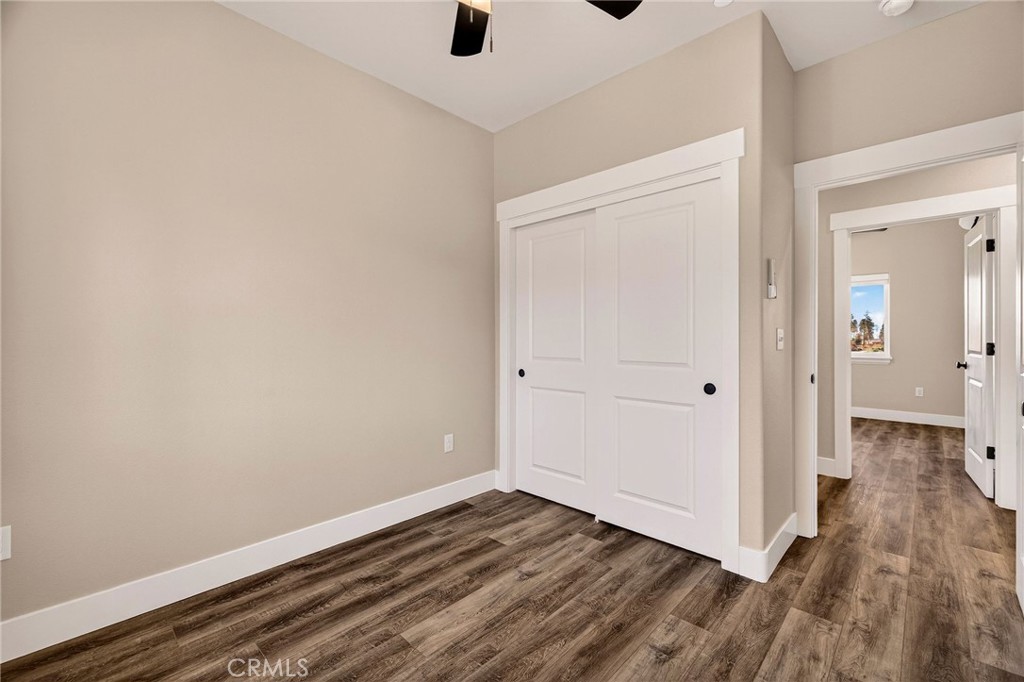 7083 Pentz Road Paradise, CA 95969 - Photo 39 of 46 a view of an empty room with wooden floor