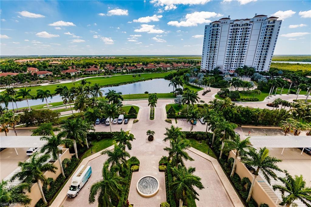 1065 Borghese Lane, Unit 1003 Naples, FL 34114 - Photo 26 of 43 a view of a city with tall buildings