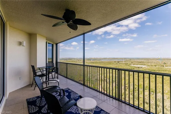 a view of balcony with chairs