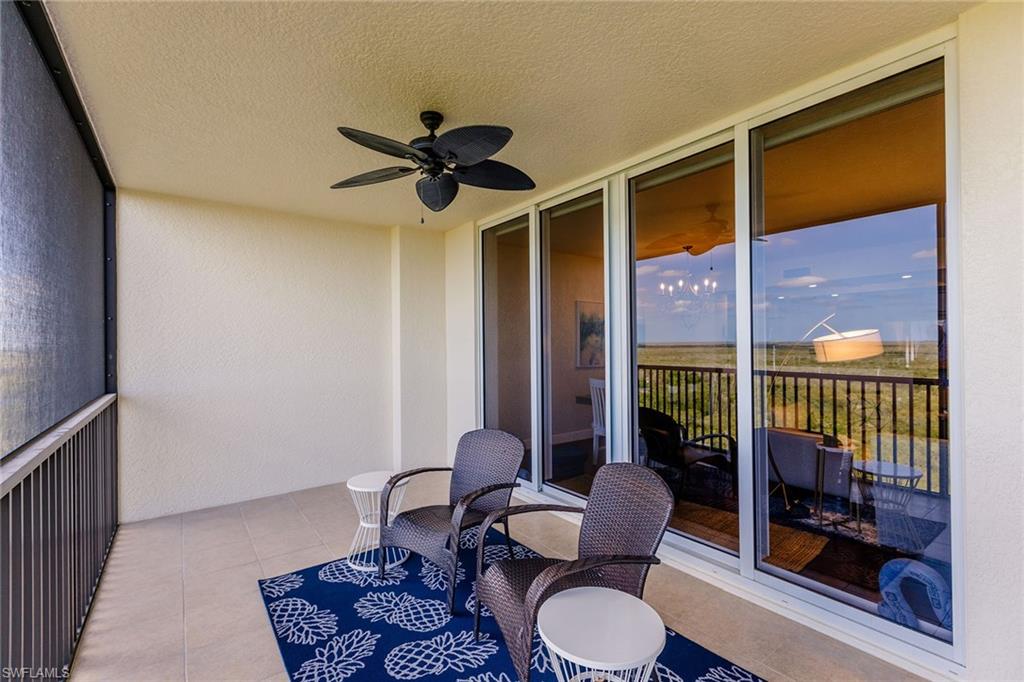 1065 Borghese Lane, Unit 1003 Naples, FL 34114 - Photo 34 of 43 a living room with furniture