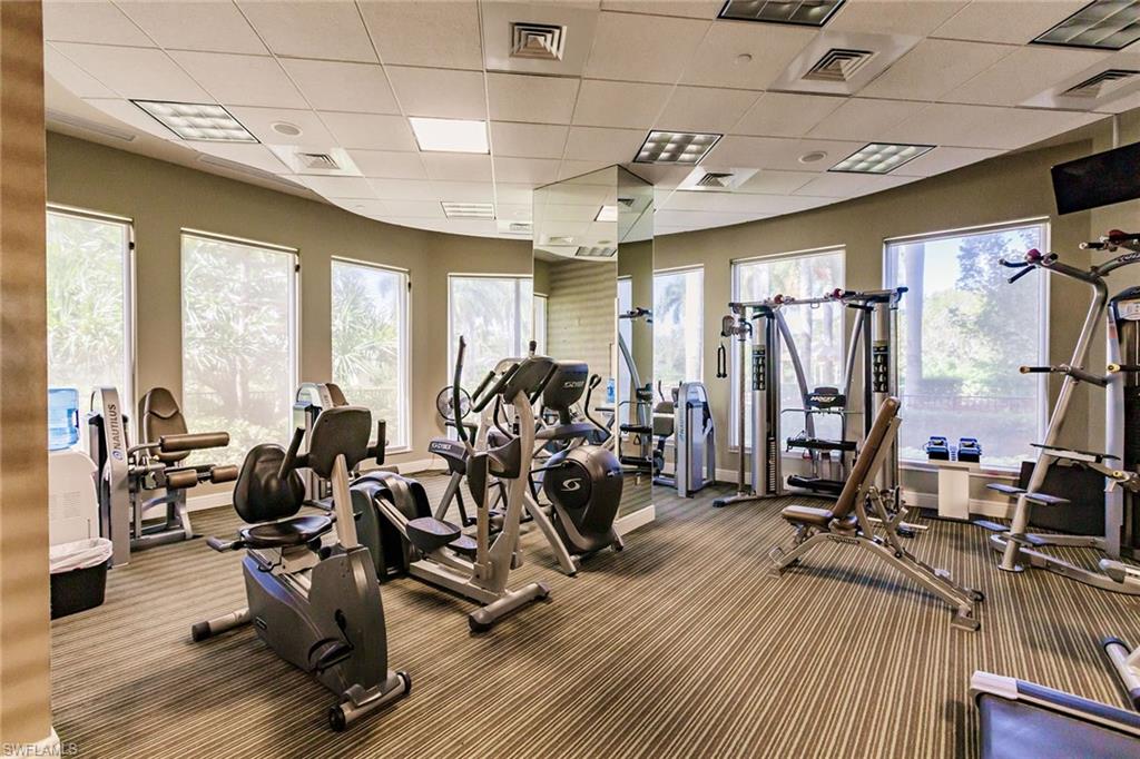 1065 Borghese Lane, Unit 1003 Naples, FL 34114 - Photo 40 of 43 a view of a room with gym equipment