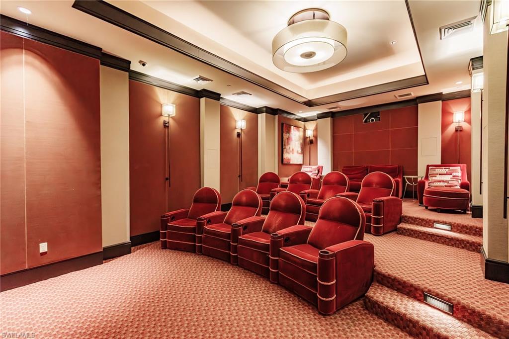 1065 Borghese Lane, Unit 1003 Naples, FL 34114 - Photo 43 of 43 a living room with furniture a ceiling fan and a rug