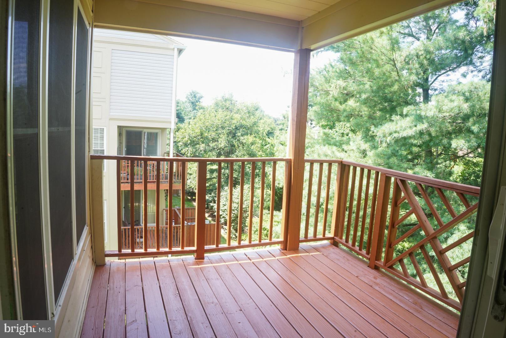 2816 Emma Lee Street, Unit 301 Falls Church, VA 22042 - Photo 14 of 45 a view of wooden balcony with wooden floor