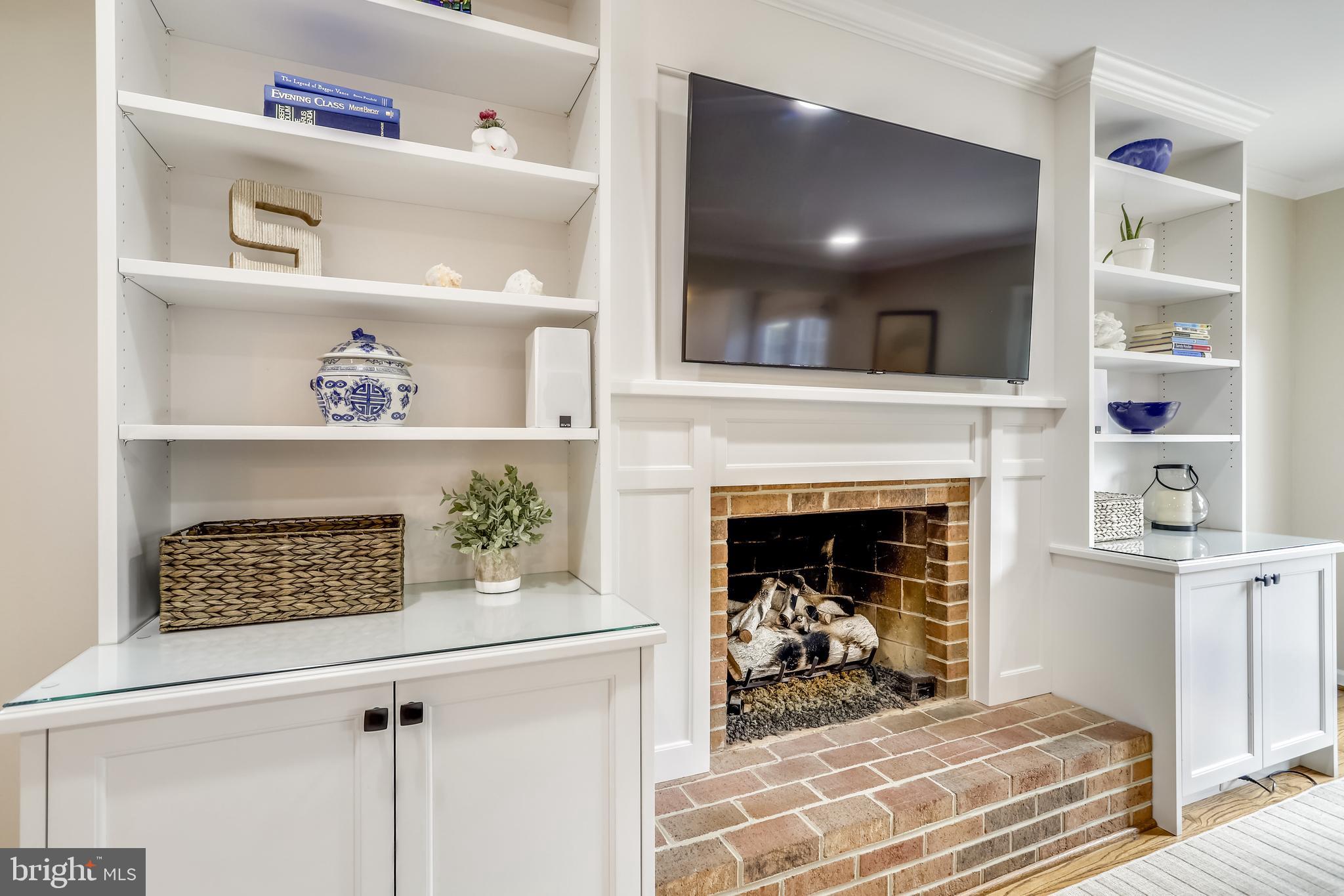 1721 Stonebridge Road Alexandria, VA 22304 - Photo 13 of 62 Custom built-ins surrounding gas fireplace