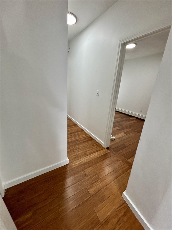 39 Shawmut Street, Unit 1 Chelsea, MA 02150 - Photo 6 of 13 a view of a hallway with wooden floor