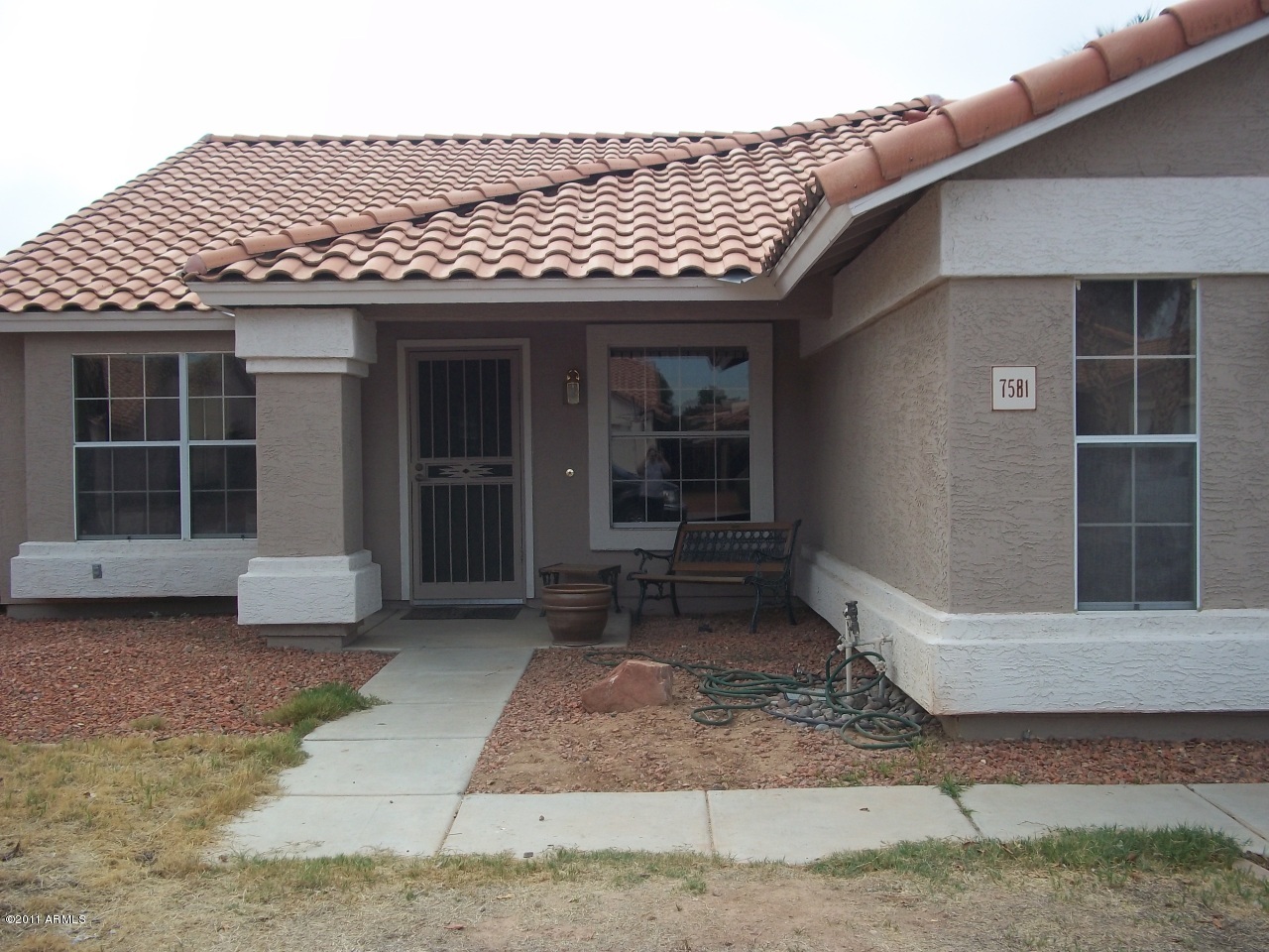 7581 West Calavar Road Peoria, AZ 85381 - Photo 1 of 14 Front of home
