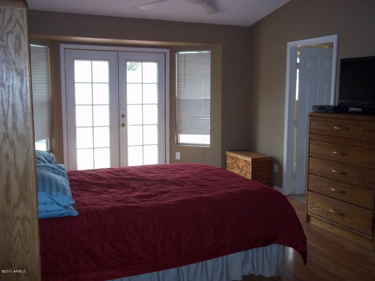 7581 West Calavar Road Peoria, AZ 85381 - Photo 7 of 14 Master bedroom