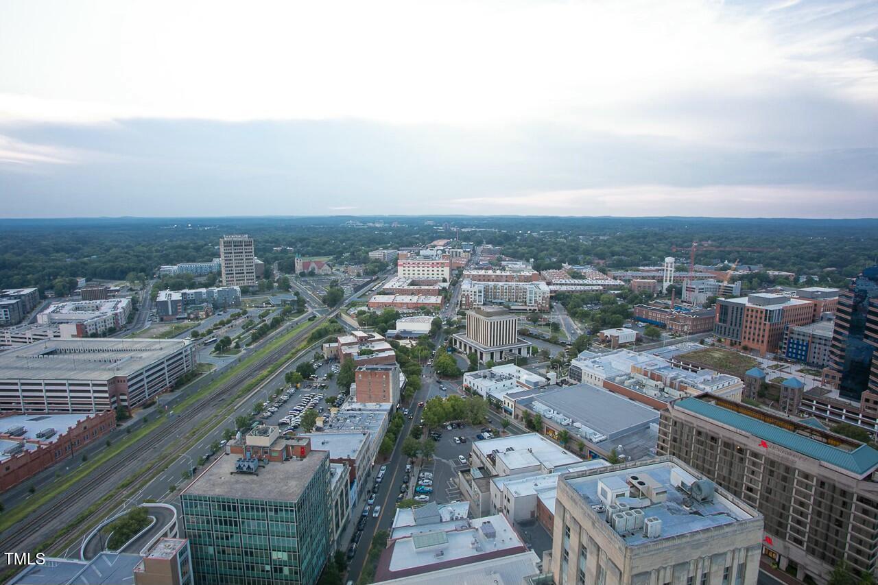 110 Corcoran Street, Unit 2502 Durham, NC 27701 - Photo 68 of 87 an aerial view of a city with lots of residential buildings