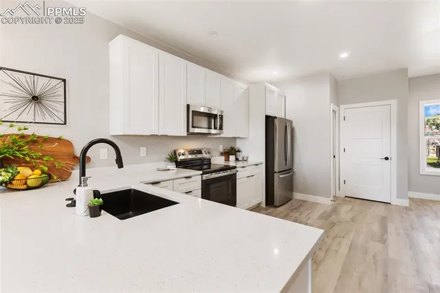a view of a dining room with furniture