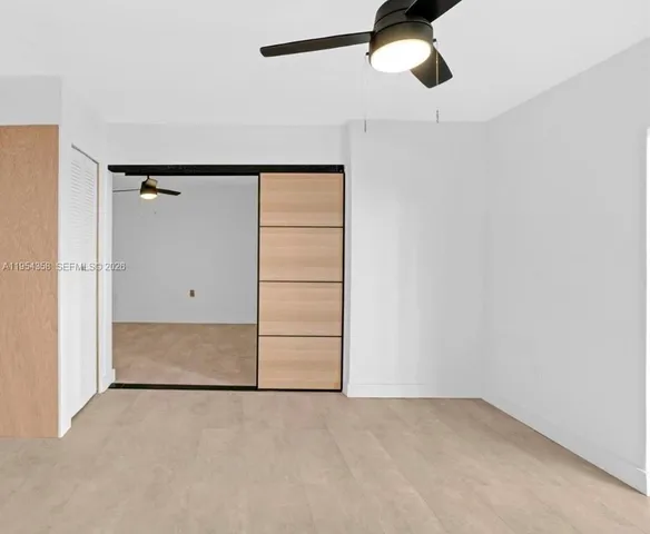 an empty room with closet