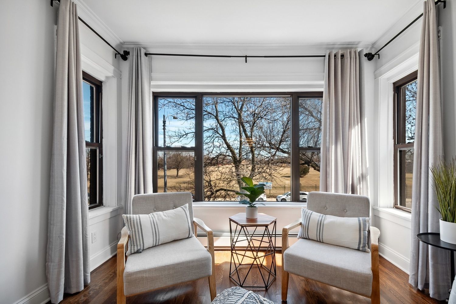5426 North Western Avenue, Unit 2 Chicago, IL 60625 - Photo 3 of 10 a living room with furniture and a large window