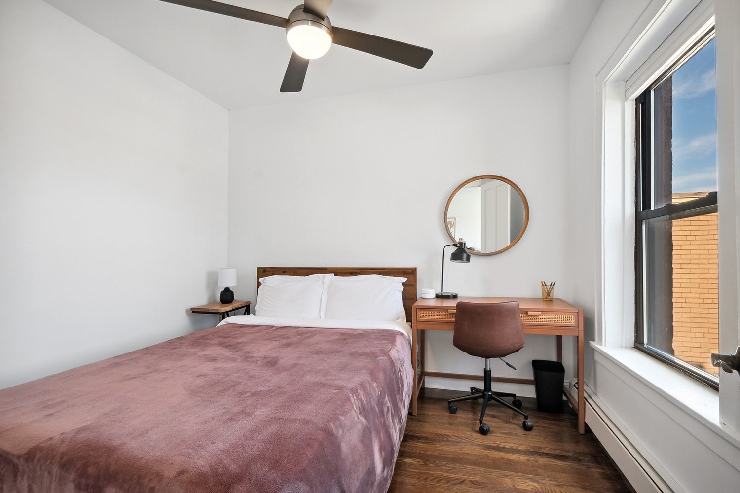 5426 North Western Avenue, Unit 2 Chicago, IL 60625 - Photo 8 of 10 a bedroom with bed and a window