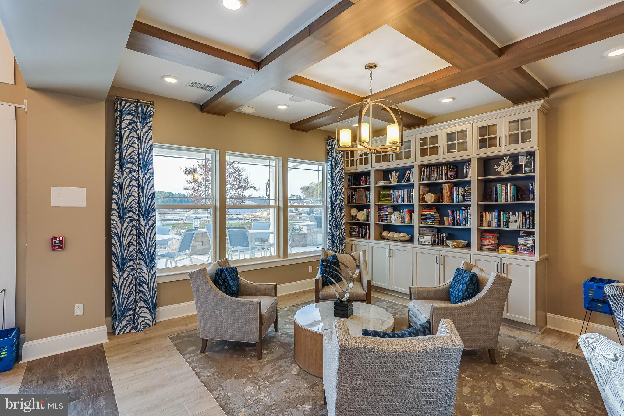 15 Golden Raintree Court Middletown, DE 19709 - Photo 17 of 25 a living room with furniture and a potted plant