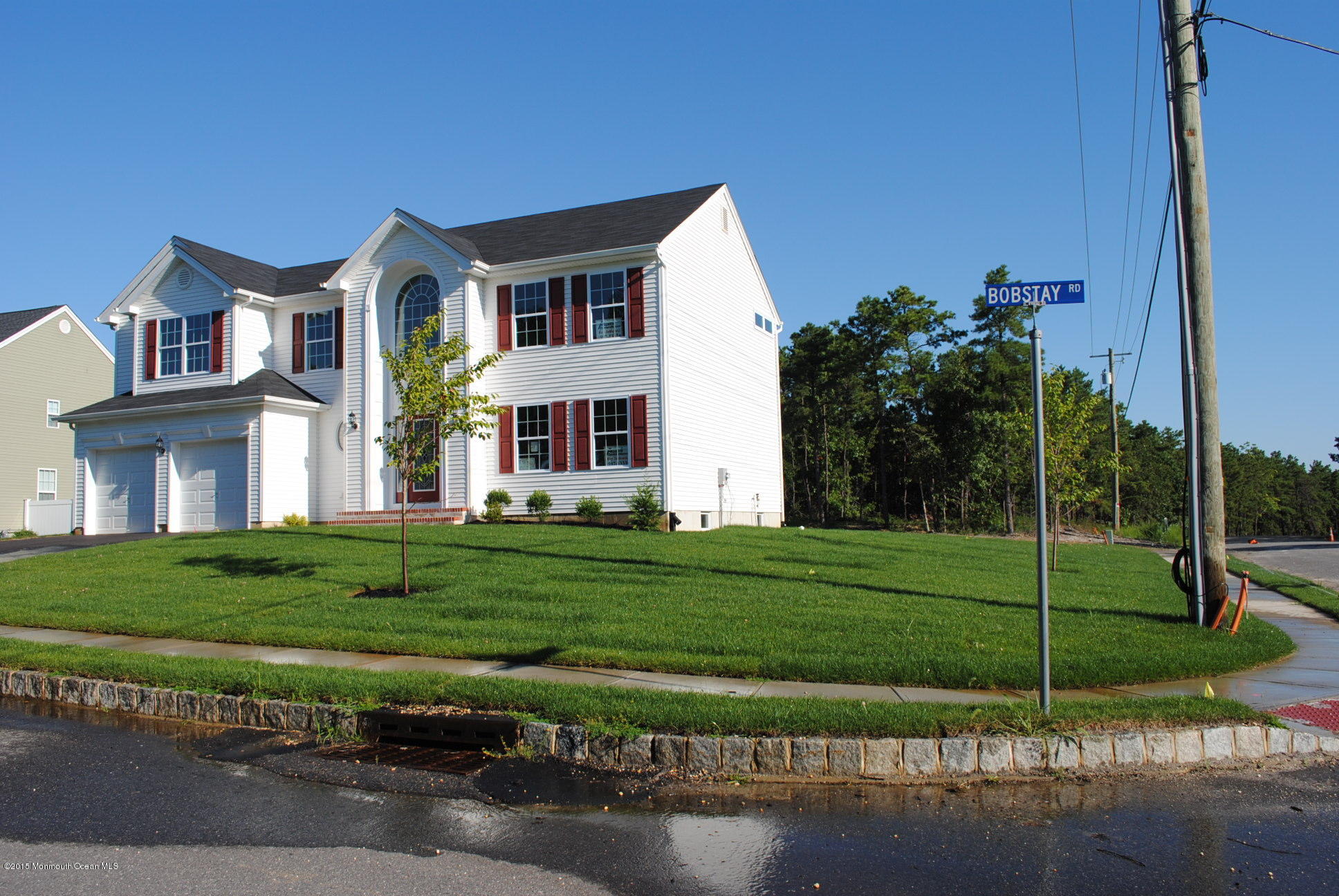 21 Bobstay Road Barnegat, NJ 08005 - Photo 2 of 17 a front view of a house with a yard