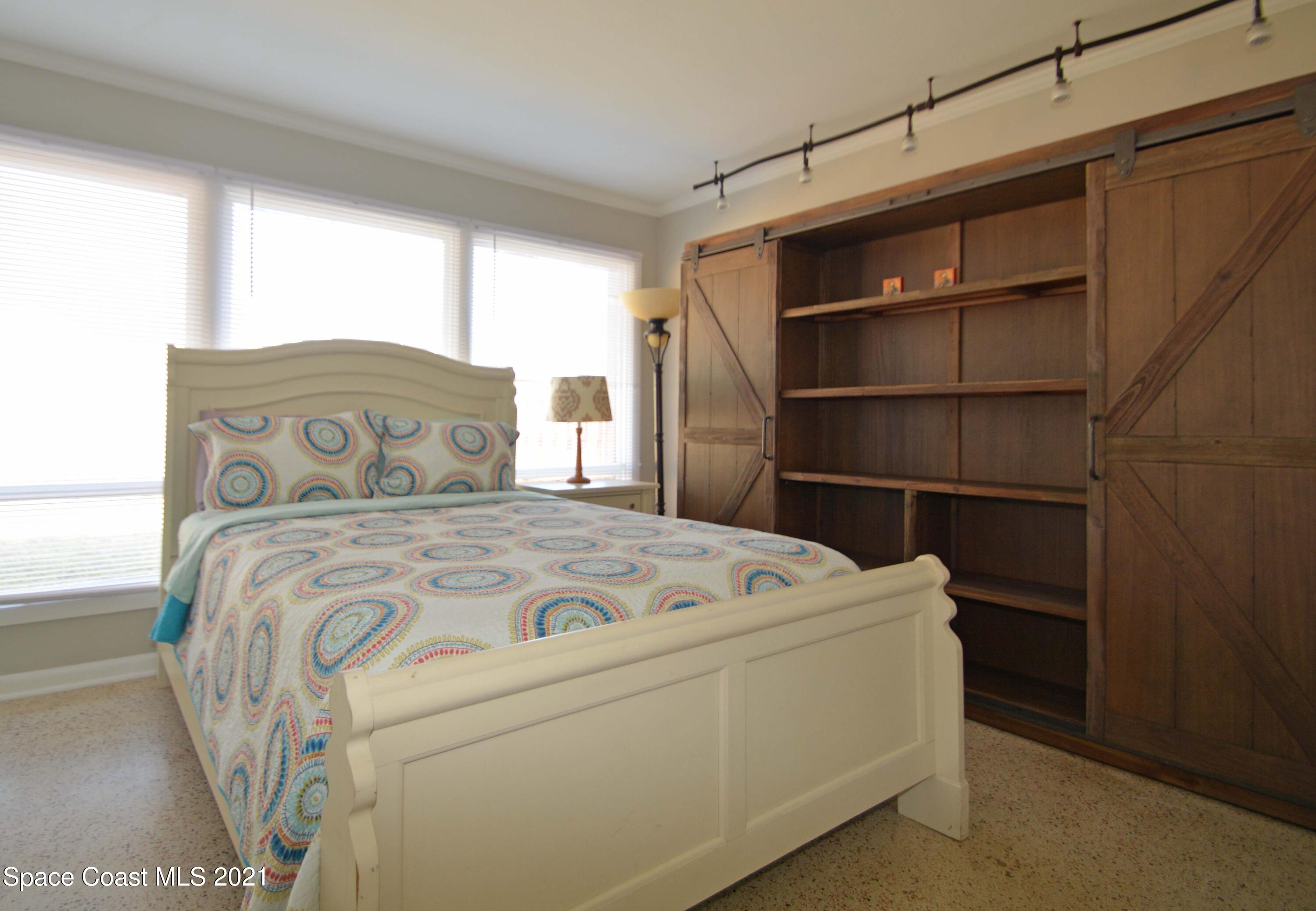 907 Santa Cruz Road Cocoa Beach, FL 32931 - Photo 10 of 30 a utility room with dryer and washer