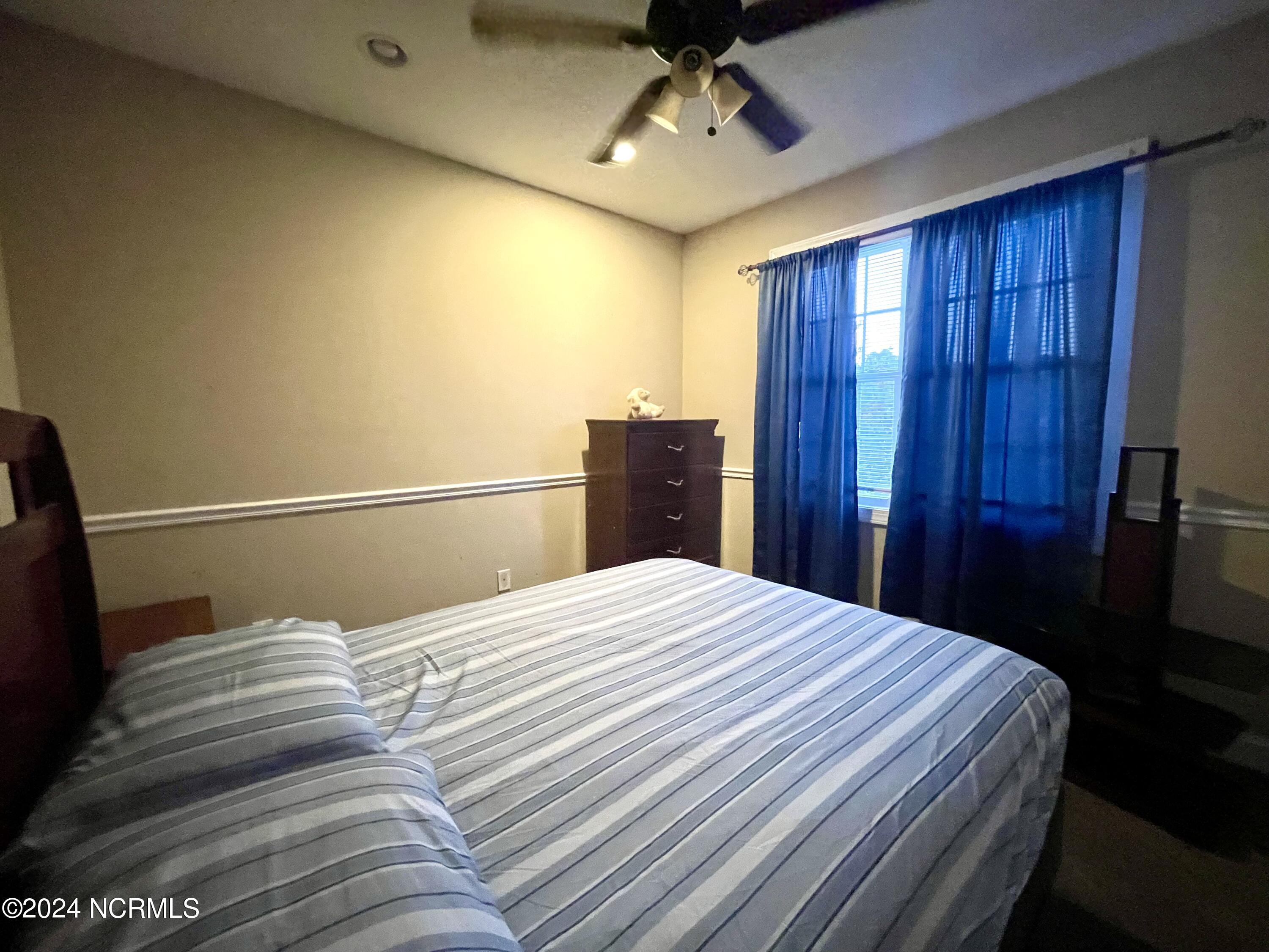 161 Randolphville Road Northeast Bolivia, NC 28422 - Photo 30 of 43 Downstairs bedroom