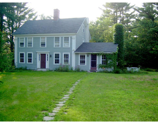 160 Dudleyville Road Leverett, MA 01054 - Photo 1 of 8 a front view of a house with a garden