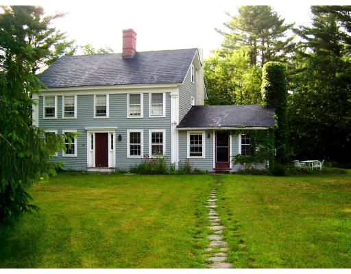 160 Dudleyville Road Leverett, MA 01054 - Photo 2 of 8 a front view of a house with a garden