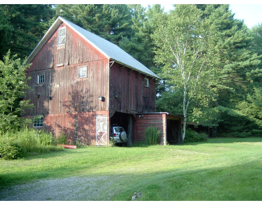 160 Dudleyville Road Leverett, MA 01054 - Photo 4 of 8 a backyard of a house with lots of green space