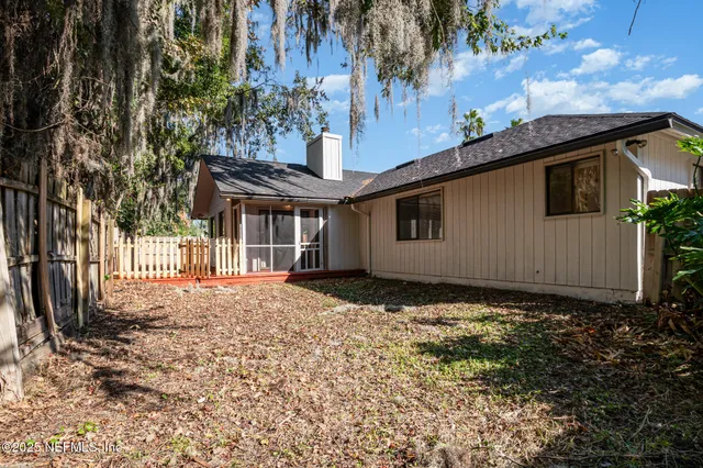 a house with trees in front of it