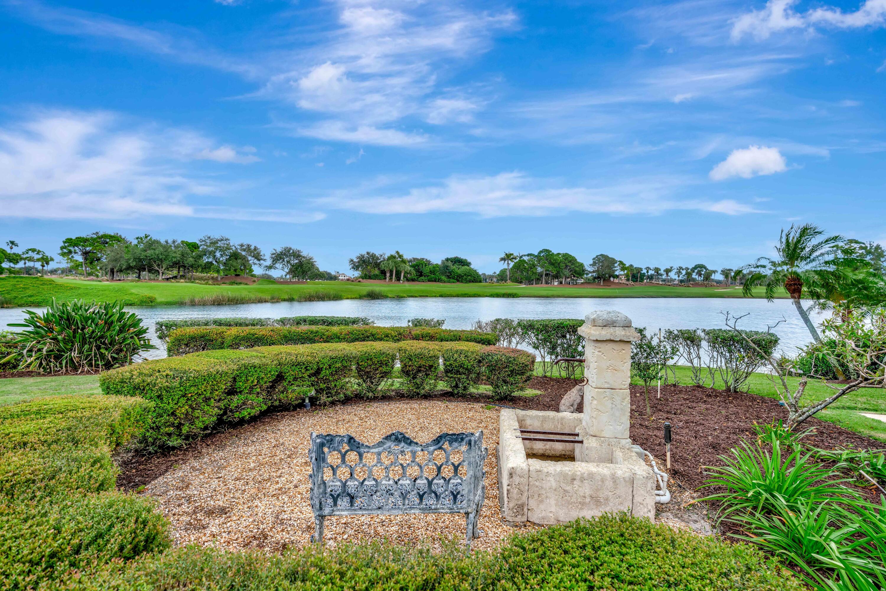 266 Locha Drive Jupiter, FL 33458 - Photo 42 of 60 a view of a lake with a big yard