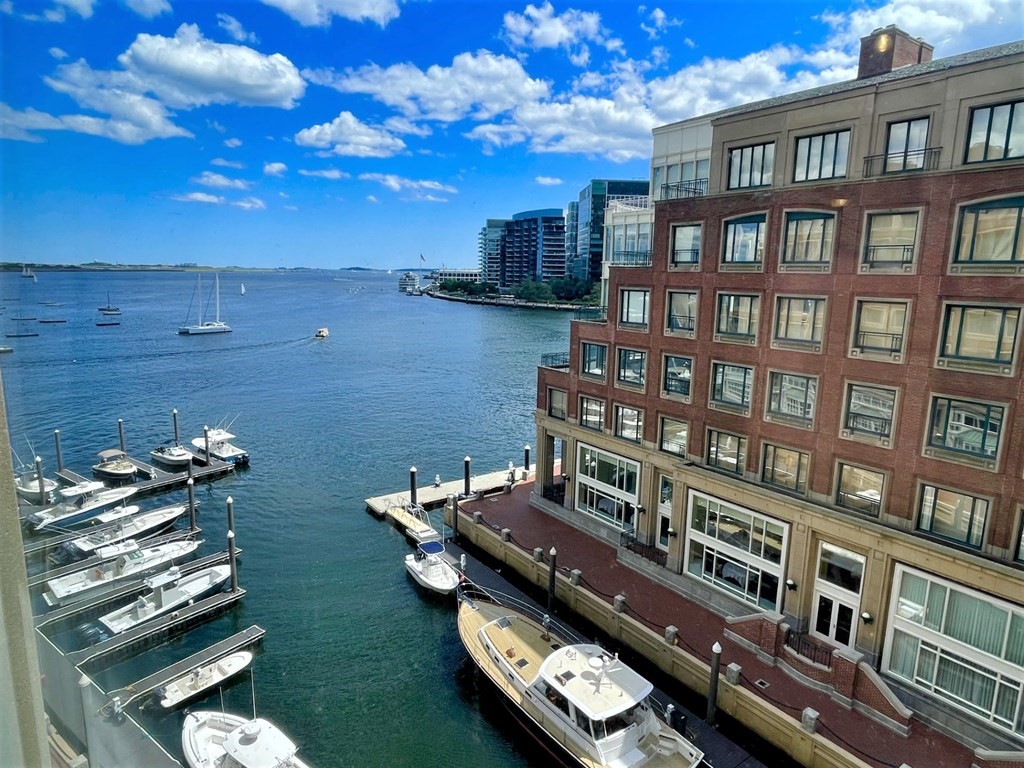 20 Rowes Wharf, Unit 604 Boston, MA 02110 - Photo 5 of 20 a view of a workspace with furniture