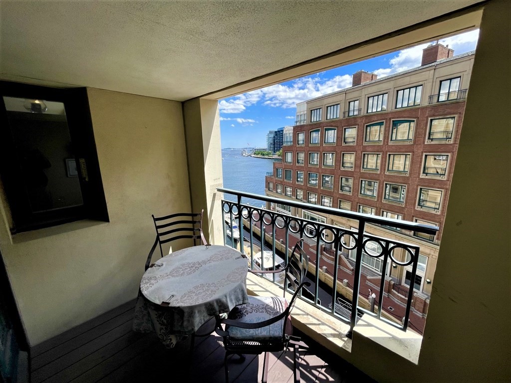 20 Rowes Wharf, Unit 604 Boston, MA 02110 - Photo 8 of 20 a balcony view with a seating space