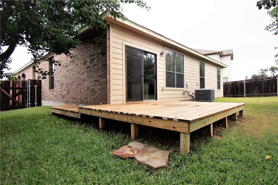 2204 Old Sterling Road Cedar Park, TX 78613 - Photo 15 of 22 a backyard of a house with table and chairs