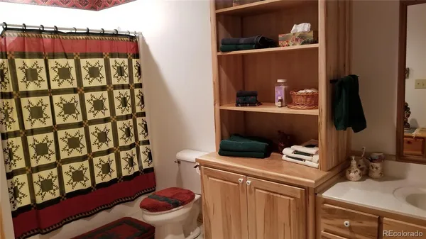 a utility room with multiple dryer and washer