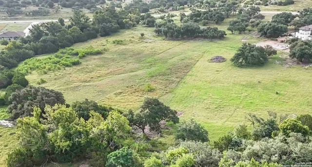 a view of a yard with an outdoor space