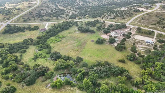 a view of a lake with a yard