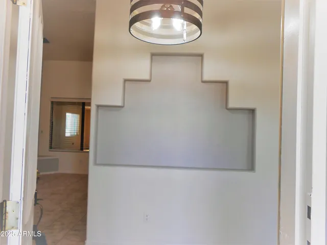 a view of a livingroom and a bathroom