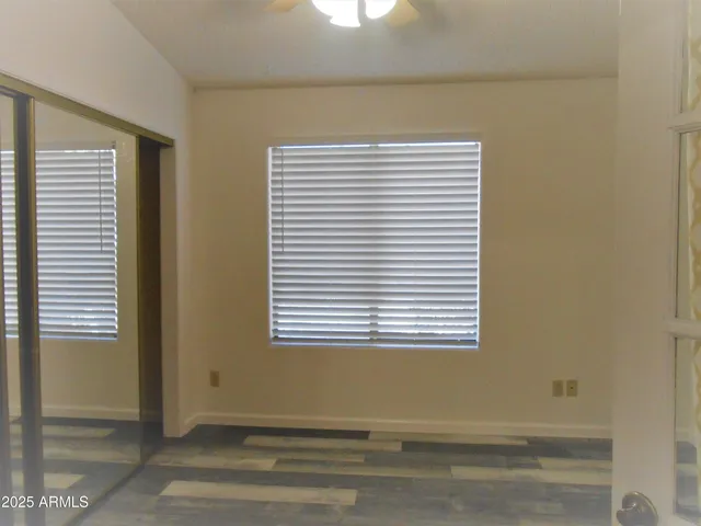 a view of a room that has a window in it