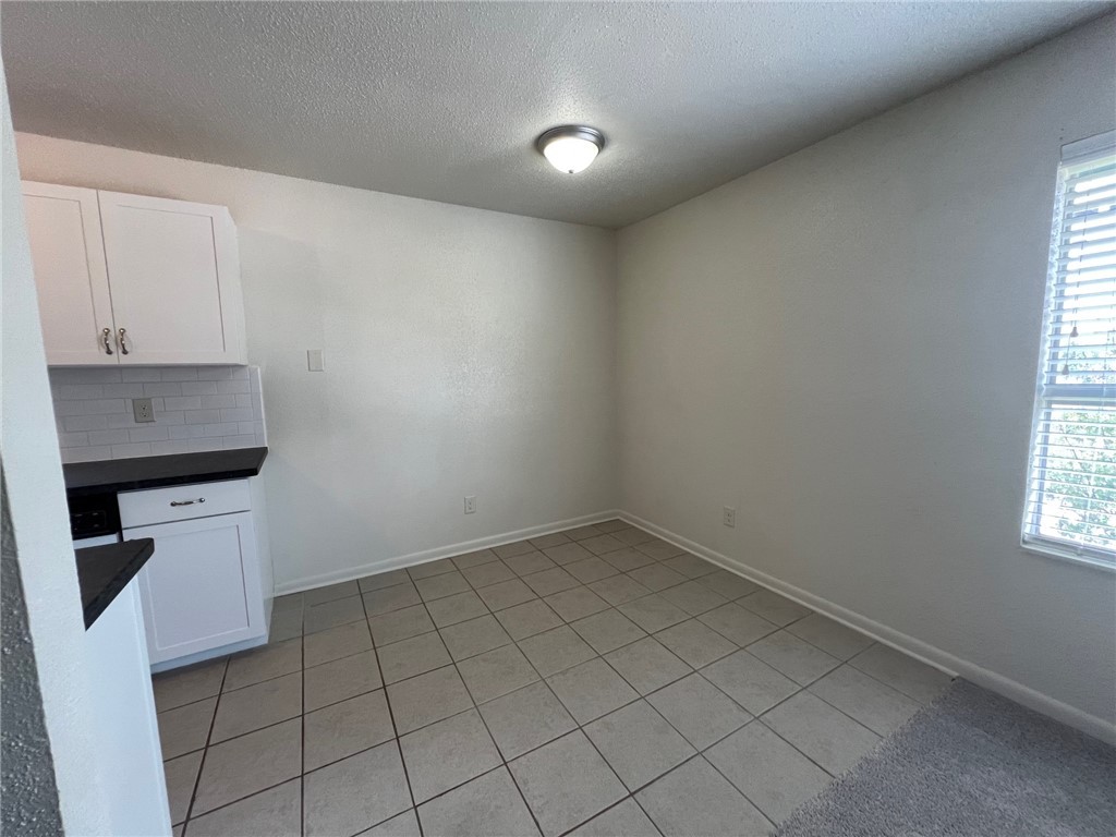 806 Natalie Street, Unit D Bryan, TX 77801 - Photo 3 of 7 a view of room and window