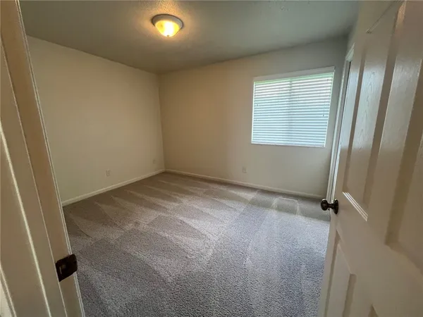 an empty room with window